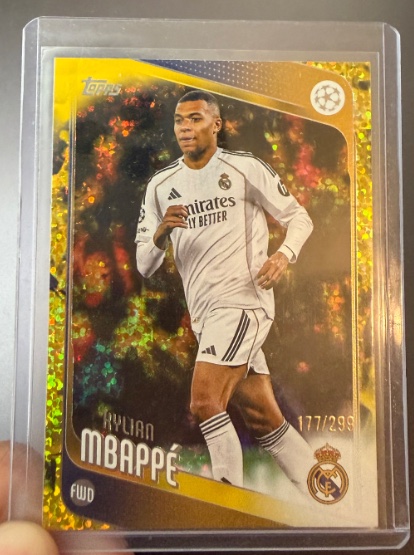 Kylian Mbappé Real Madrid trading card, serial numbered 177/299
